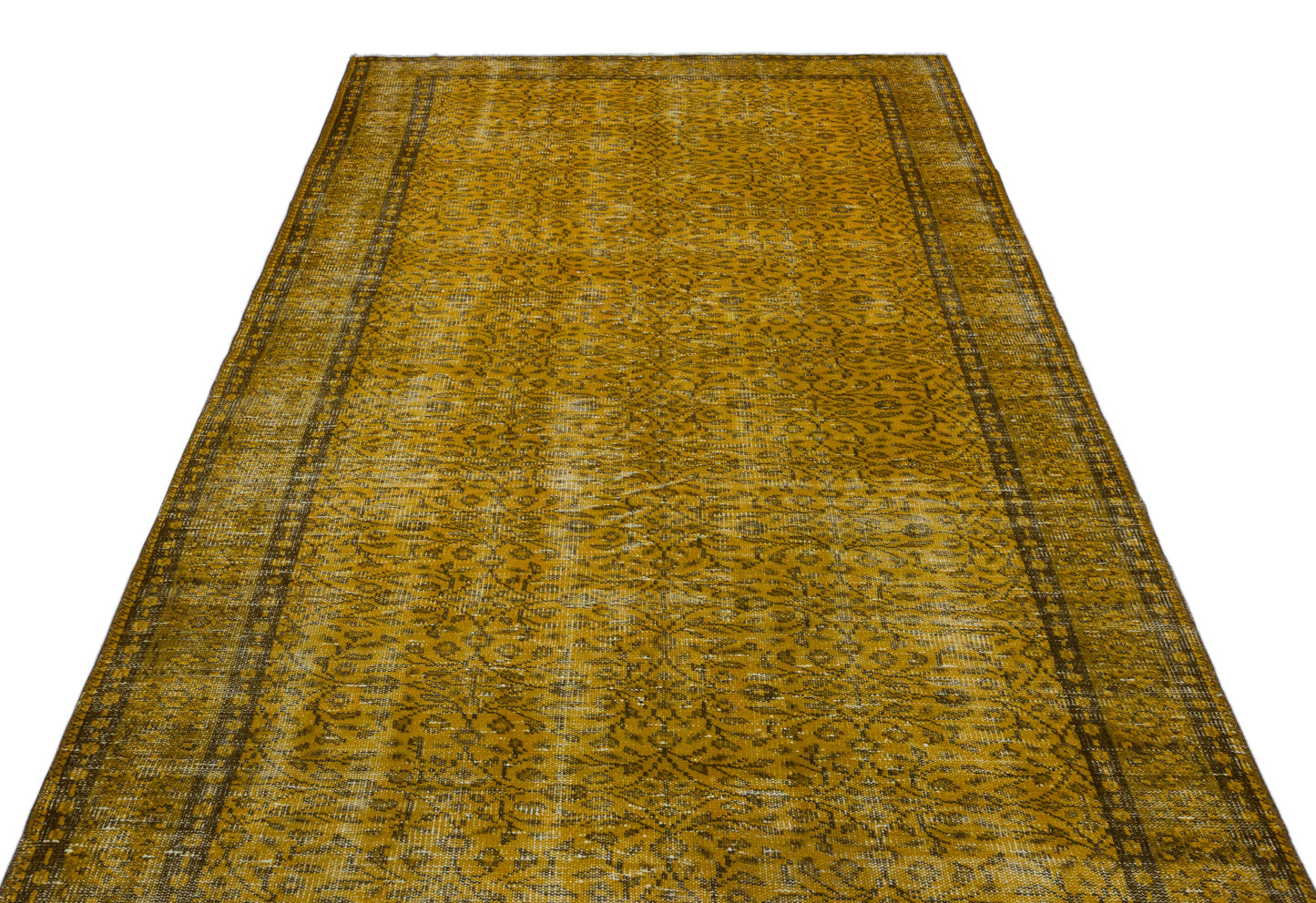 Mustard yellow vintage-style rug with a distressed floral pattern and dark border on a white background.