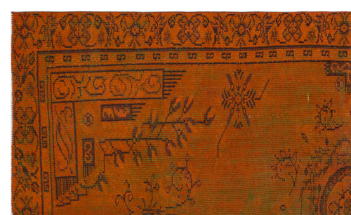 Load image 1 in gallery view. Burnt orange rug with a dark brown traditional border and scattered geometric and floral motifs.