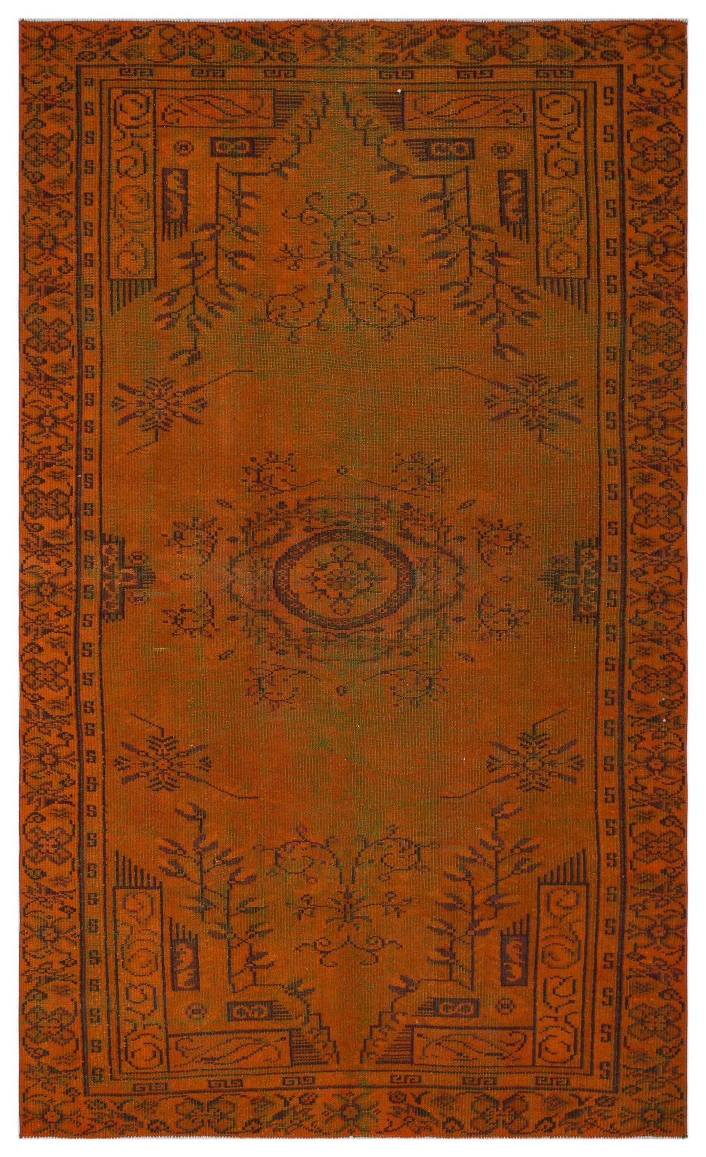 Burnt orange rug with a dark brown central medallion and traditional geometric border patterns.