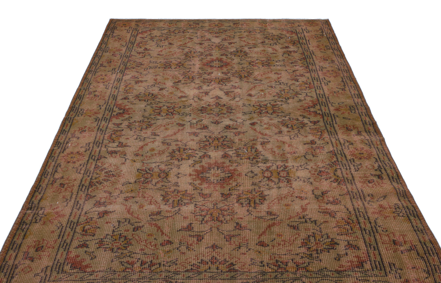 Distressed brown and rust-toned traditional rug with a faded floral medallion pattern and a geometric border.