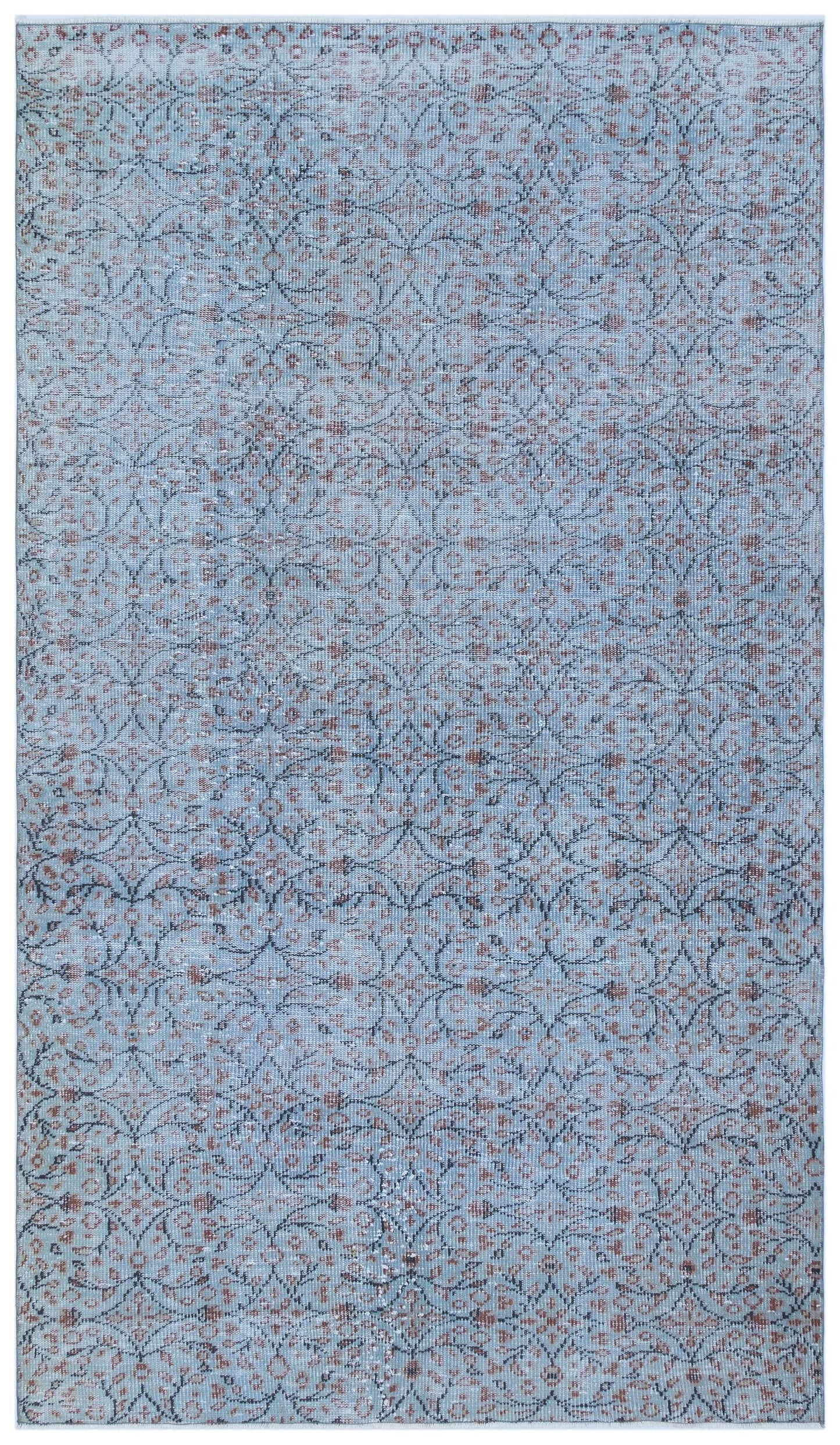 Light blue rug with a distressed, repeating dark grey and rust-colored floral medallion pattern.