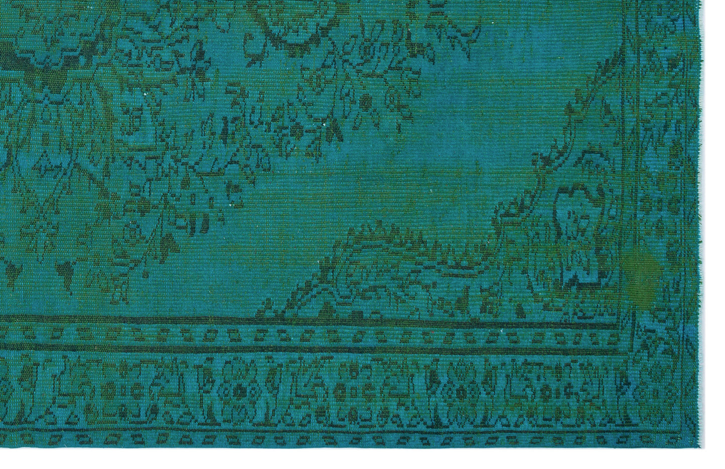 Teal and dark green rug with a traditional distressed floral medallion pattern and a detailed border.