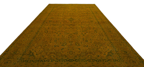 Load image 1 in gallery view. Mustard yellow traditional rug with a dark green floral medallion pattern and ornate border on a white background.