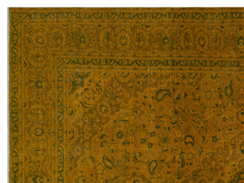 Load image 1 in gallery view. Ochre and dark green traditional rug with an intricate floral and paisley border pattern.