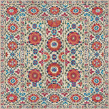 Decorative floral rug with a geometric pattern on a beige background