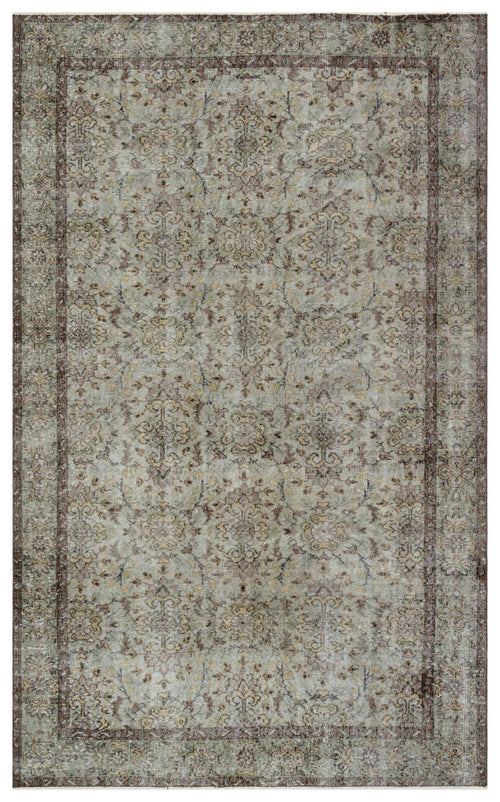 Load image 1 in gallery view. Distressed sage green and brown rug with a traditional floral medallion pattern and a dark border.