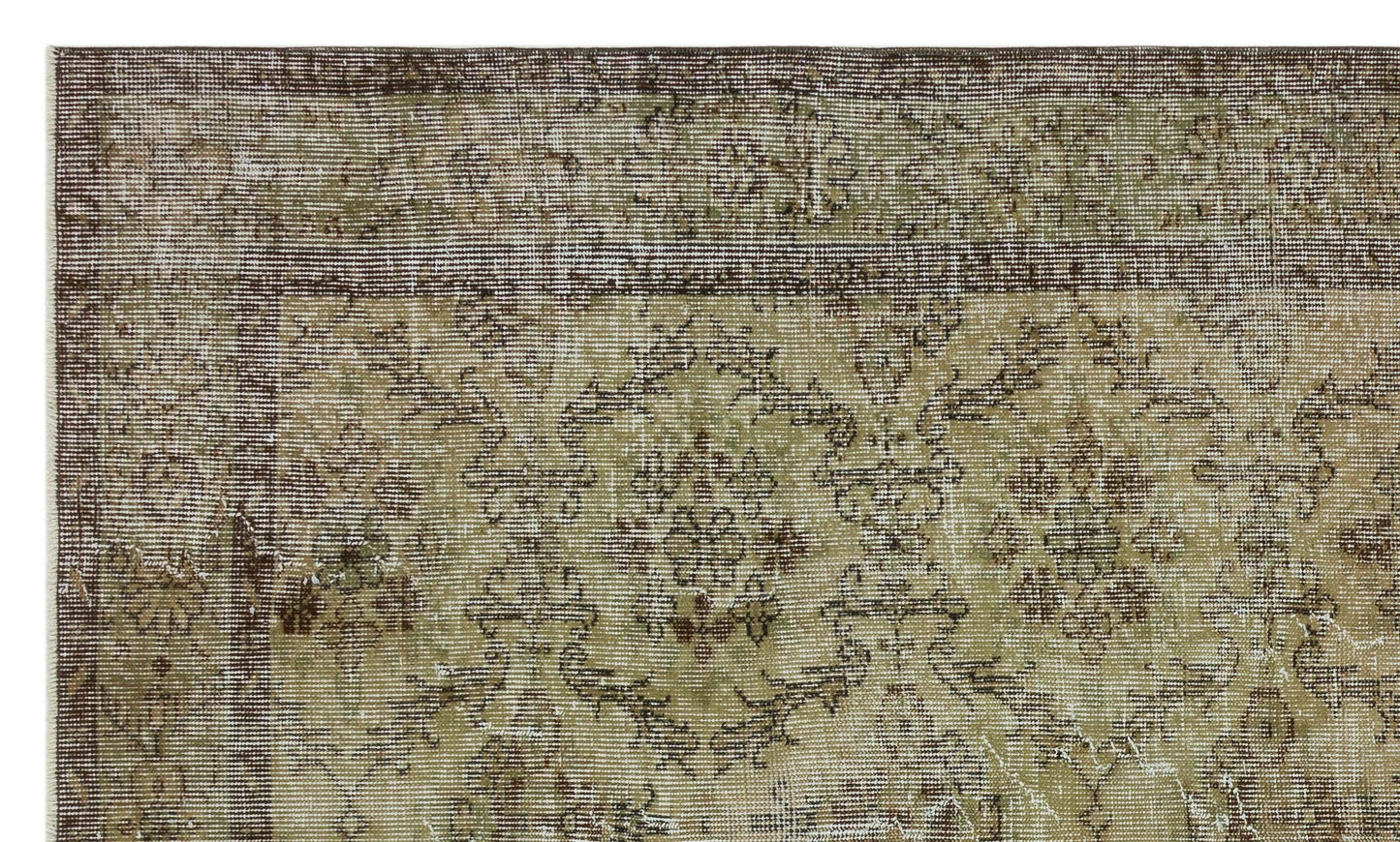 Distressed olive green and brown rug with a traditional floral medallion pattern and a wide decorative border.