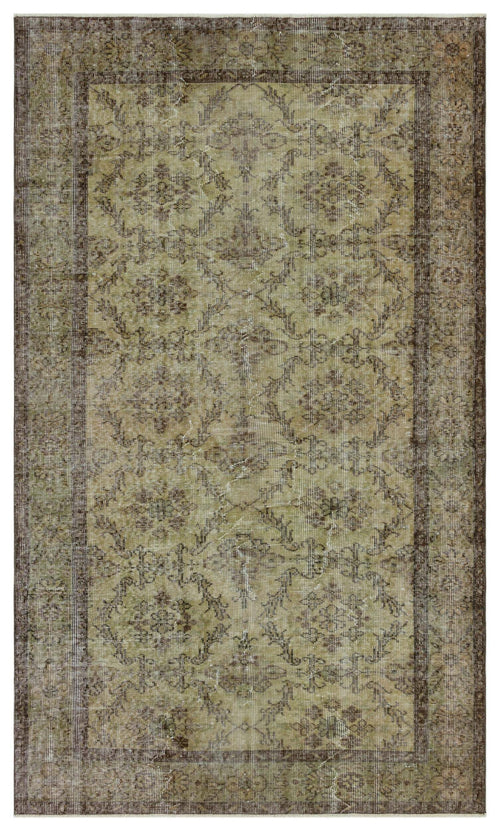 Bild 1 in Galerieansicht laden. Olive green and brown distressed traditional rug with a repeating floral medallion pattern and a wide border.
