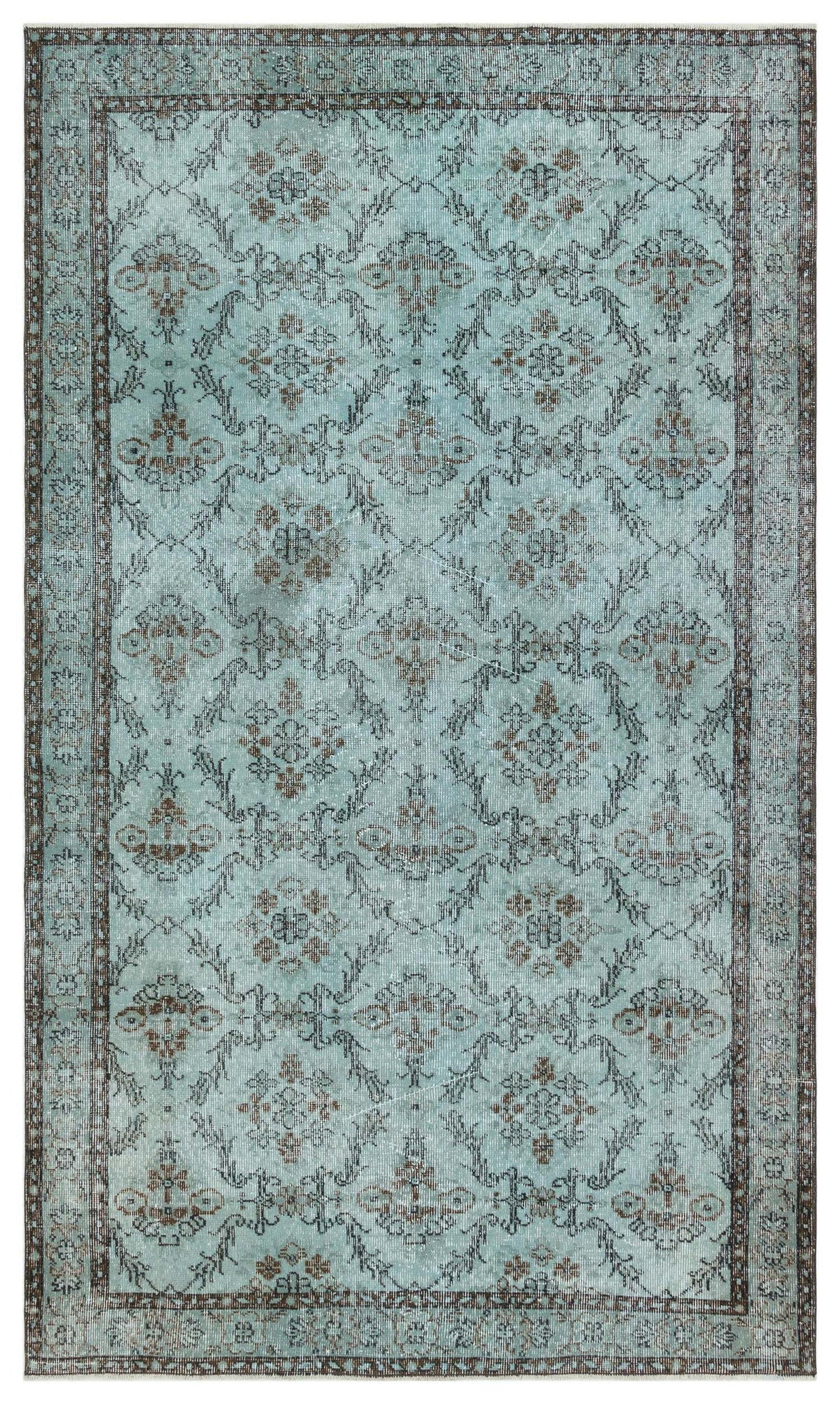 Light blue distressed rug with a dark brown floral medallion pattern and a geometric lattice border.