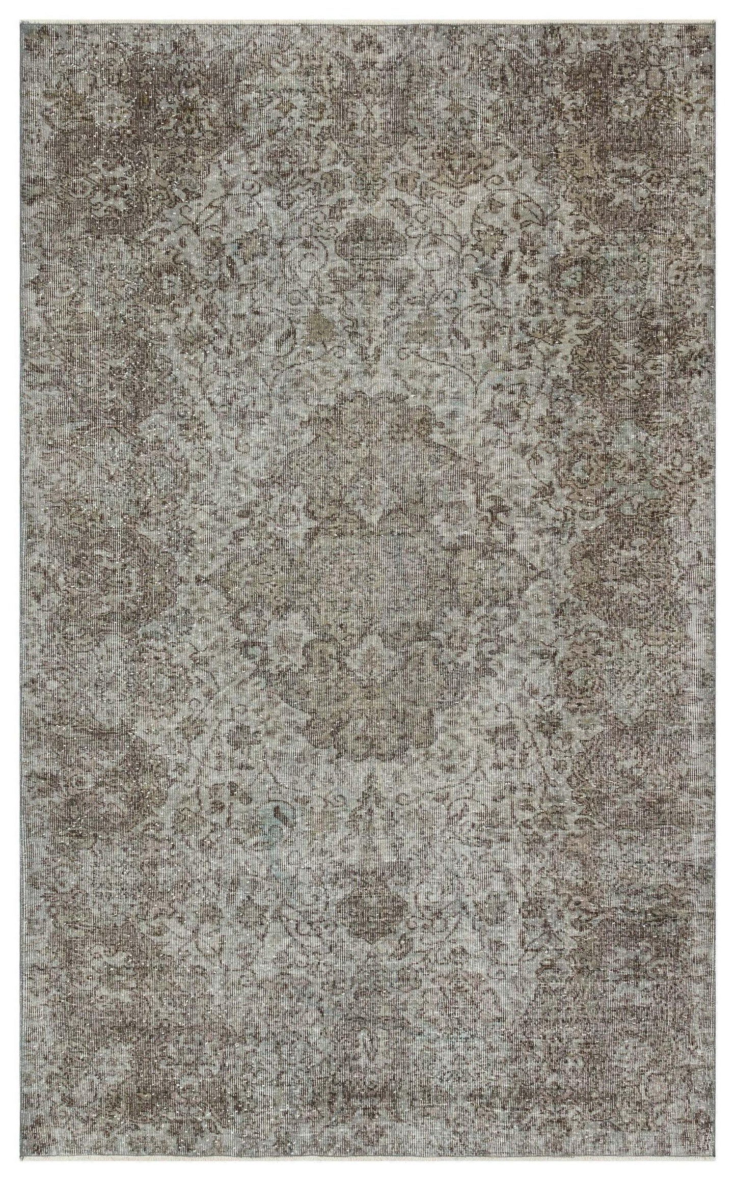 Grey and brown distressed traditional rug with a faded central medallion pattern on a white background.