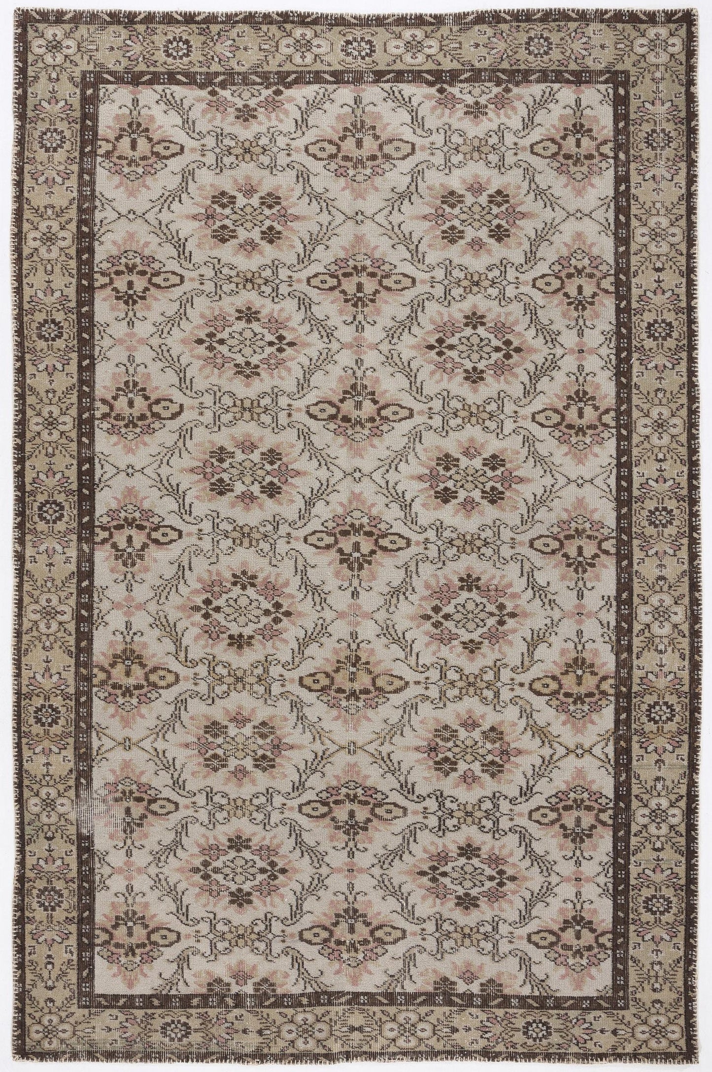 Beige and brown traditional rug with a repeating floral medallion pattern and a dark brown border.