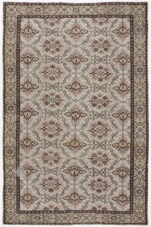 Load image 1 in gallery view. Beige and brown traditional rug with a repeating floral medallion pattern and a dark brown border.