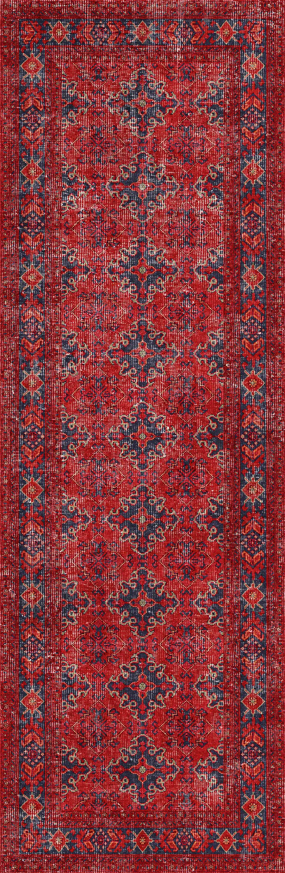 Red patterned runner rug with intricate designs