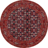 Round red patterned rug