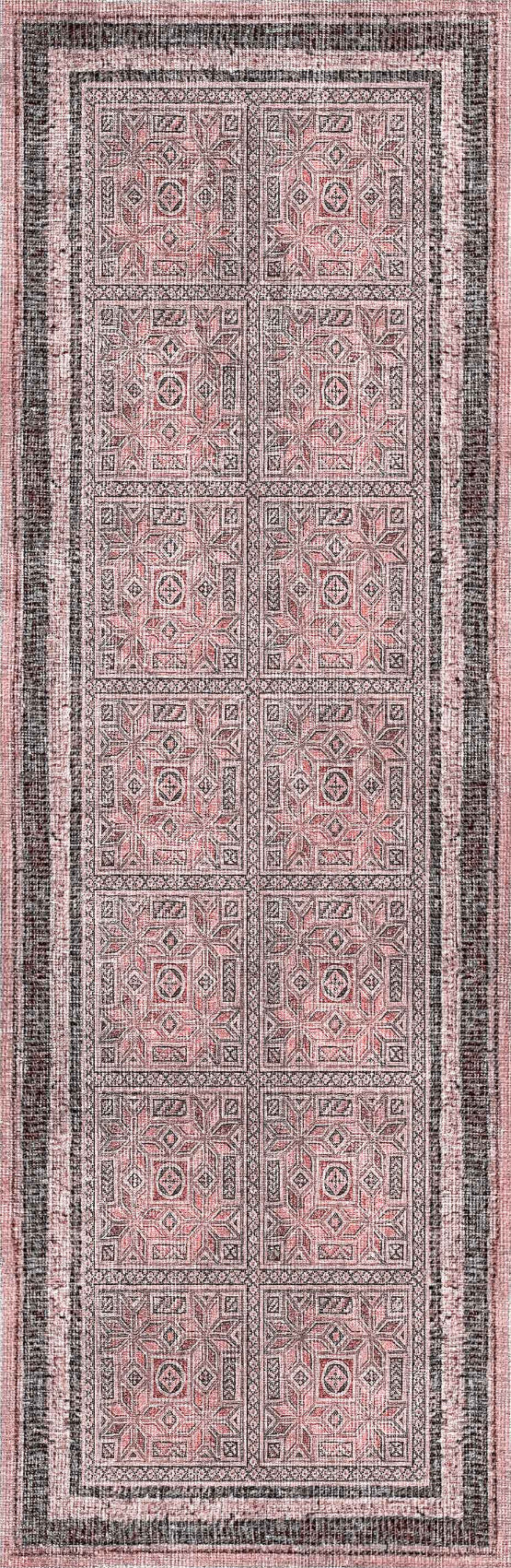 Patterned rug with a mix of pink and gray colors on a dark background