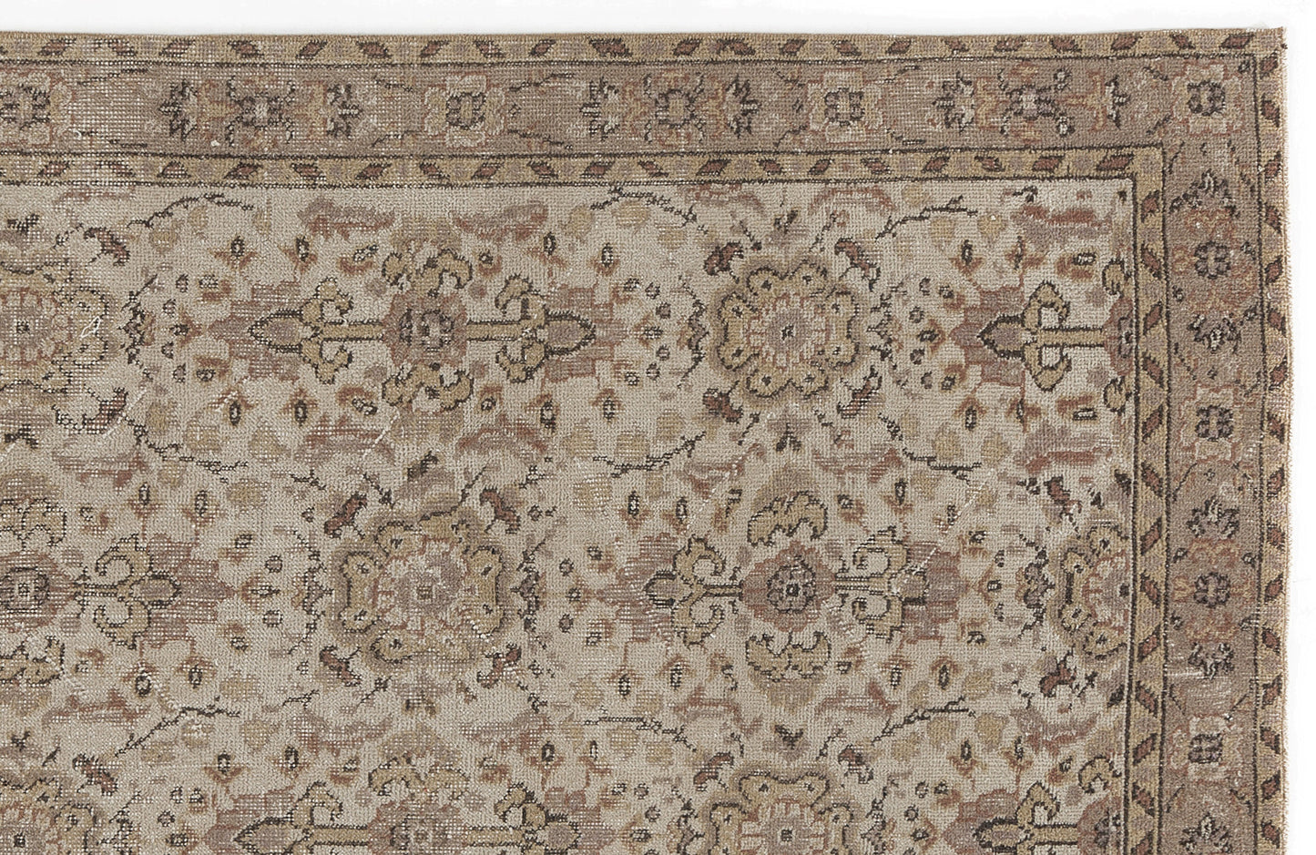 Beige and brown traditional rug with a distressed floral medallion pattern and a decorative border.