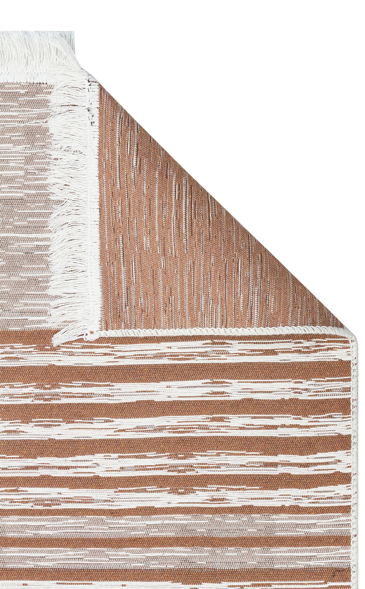 A close-up of the Calm Thread - Washable Double-Sided Kilims - AR27, a rectangular recycled cotton rug with brown and white horizontal stripes, white fringed edges, and a folded corner that reveals a similar striped pattern on the reverse side.
