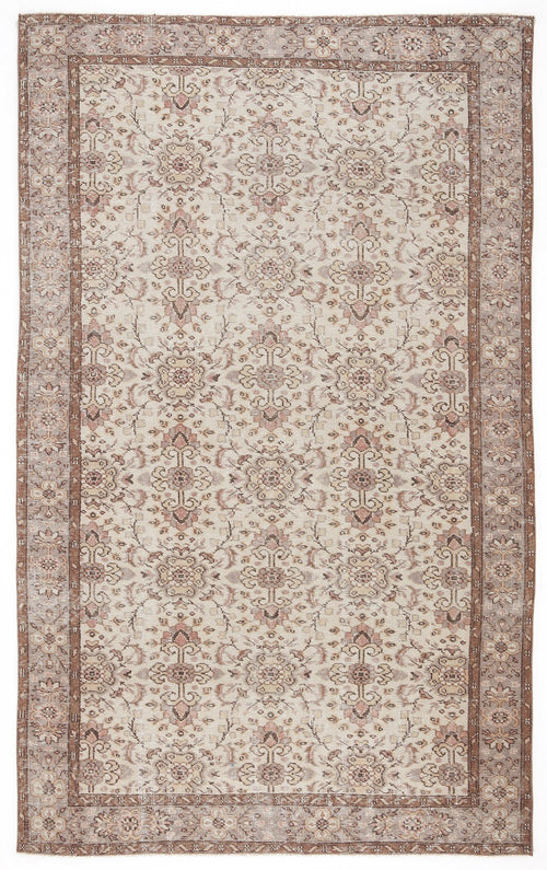 Load image 1 in gallery view. Beige and muted rose vintage-style rug with a traditional floral medallion pattern and a wide decorative border.