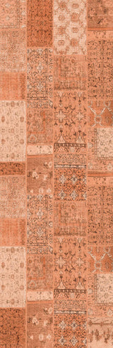 Patchwork patterned orange runner rug