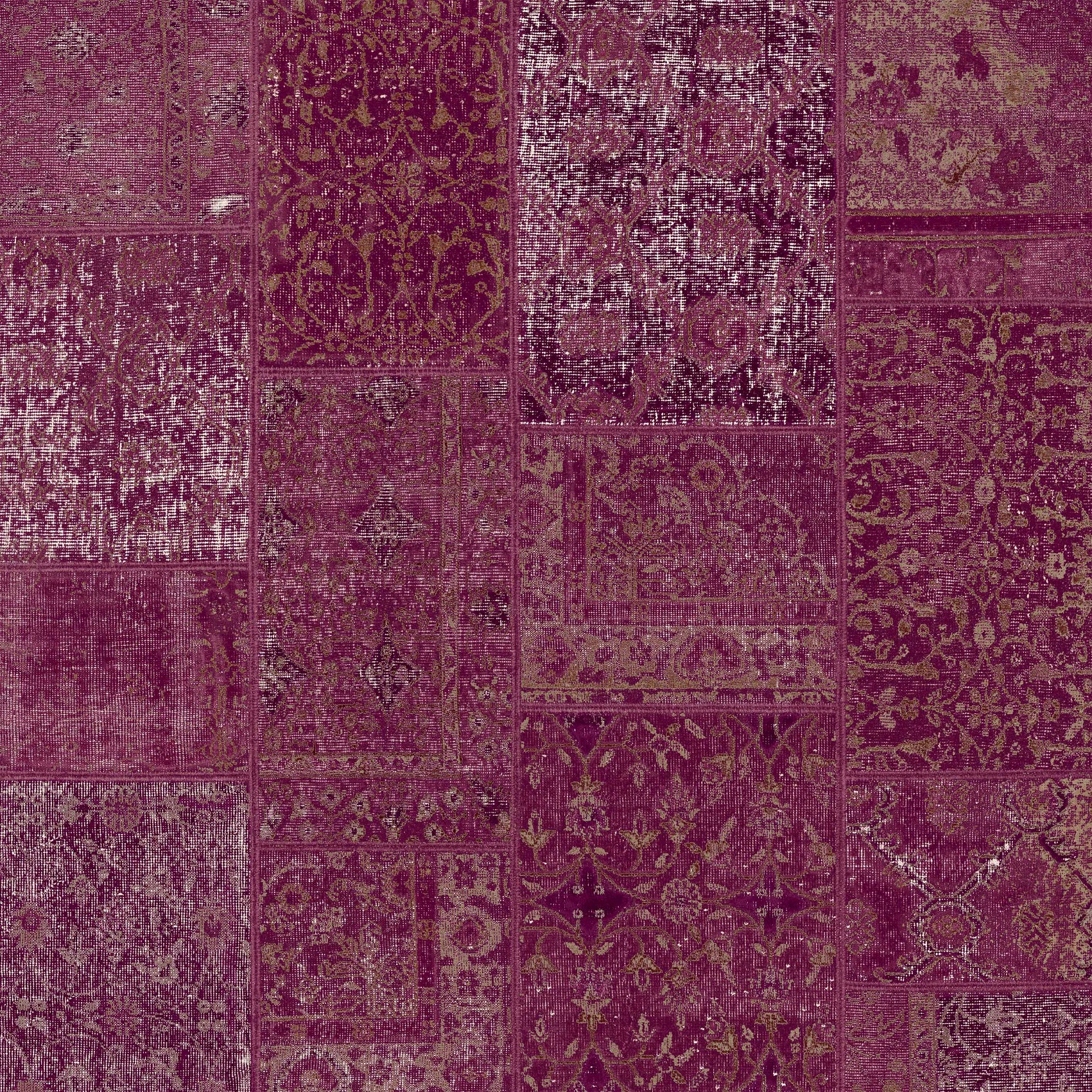 Patchwork pattern rug with purple tones