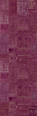 Patterned purple rug with a patchwork design