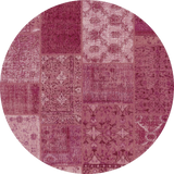 Round patchwork rug with purple and pink patterns