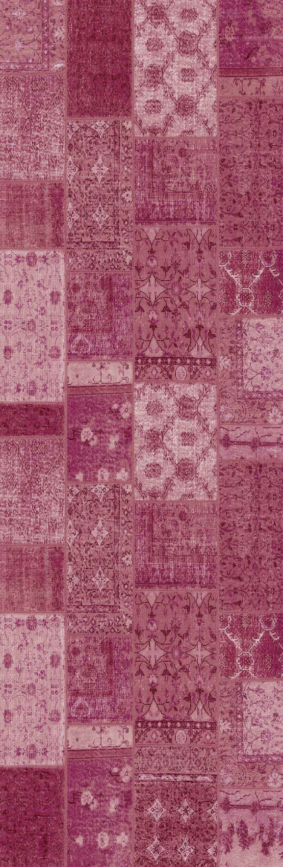 Patterned runner rug with a patchwork design in shades of pink and purple.