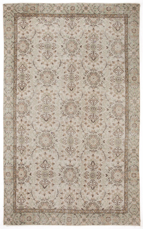 Load image 1 in gallery view. Beige and sage green vintage-style rug with a repeating floral medallion pattern and a decorative border.