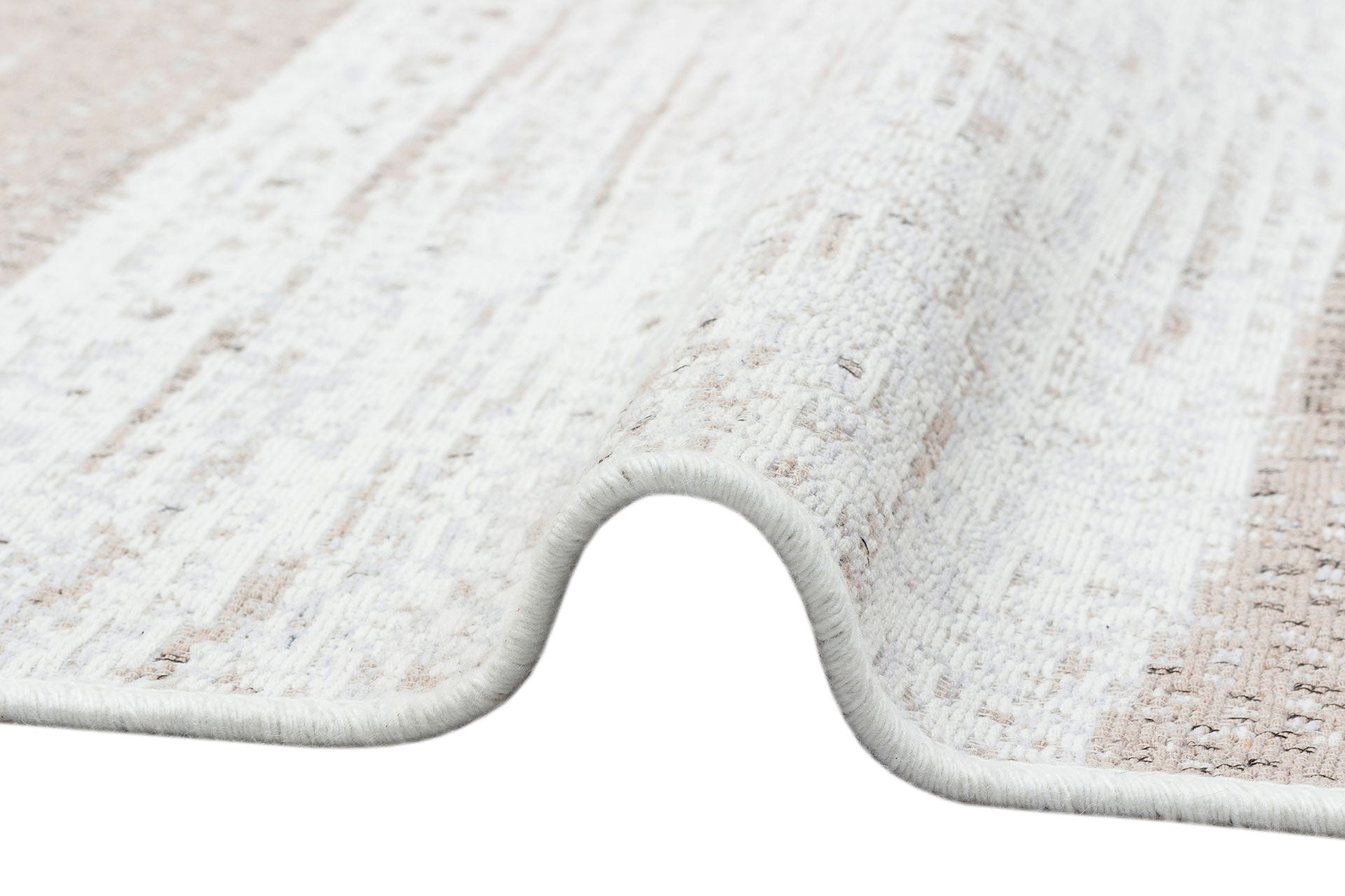 Close-up of the Earth Lines - Washable Double-Sided Kilims - AR06 in beige and white, showing its allergy-friendly texture, thickness, and wavy fold against a white background.