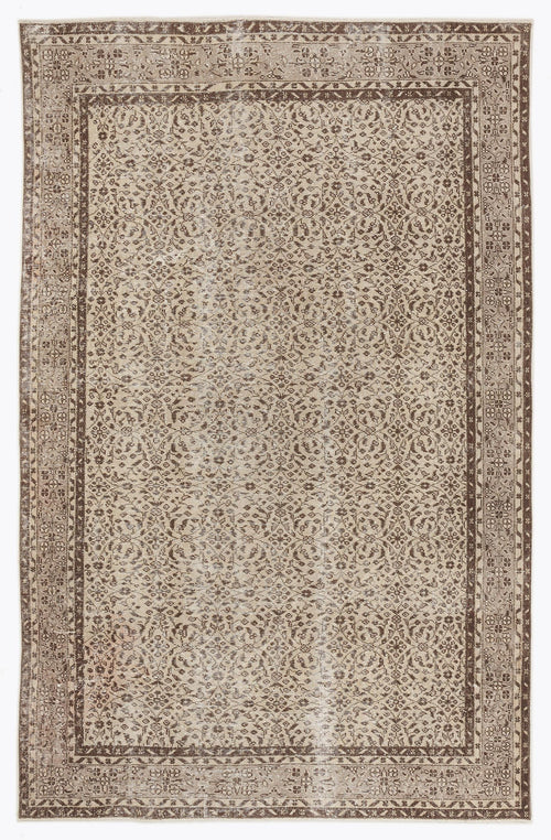 Load image 1 in gallery view. Brown and beige vintage-style rug with an intricate floral medallion pattern and a wide decorative border.