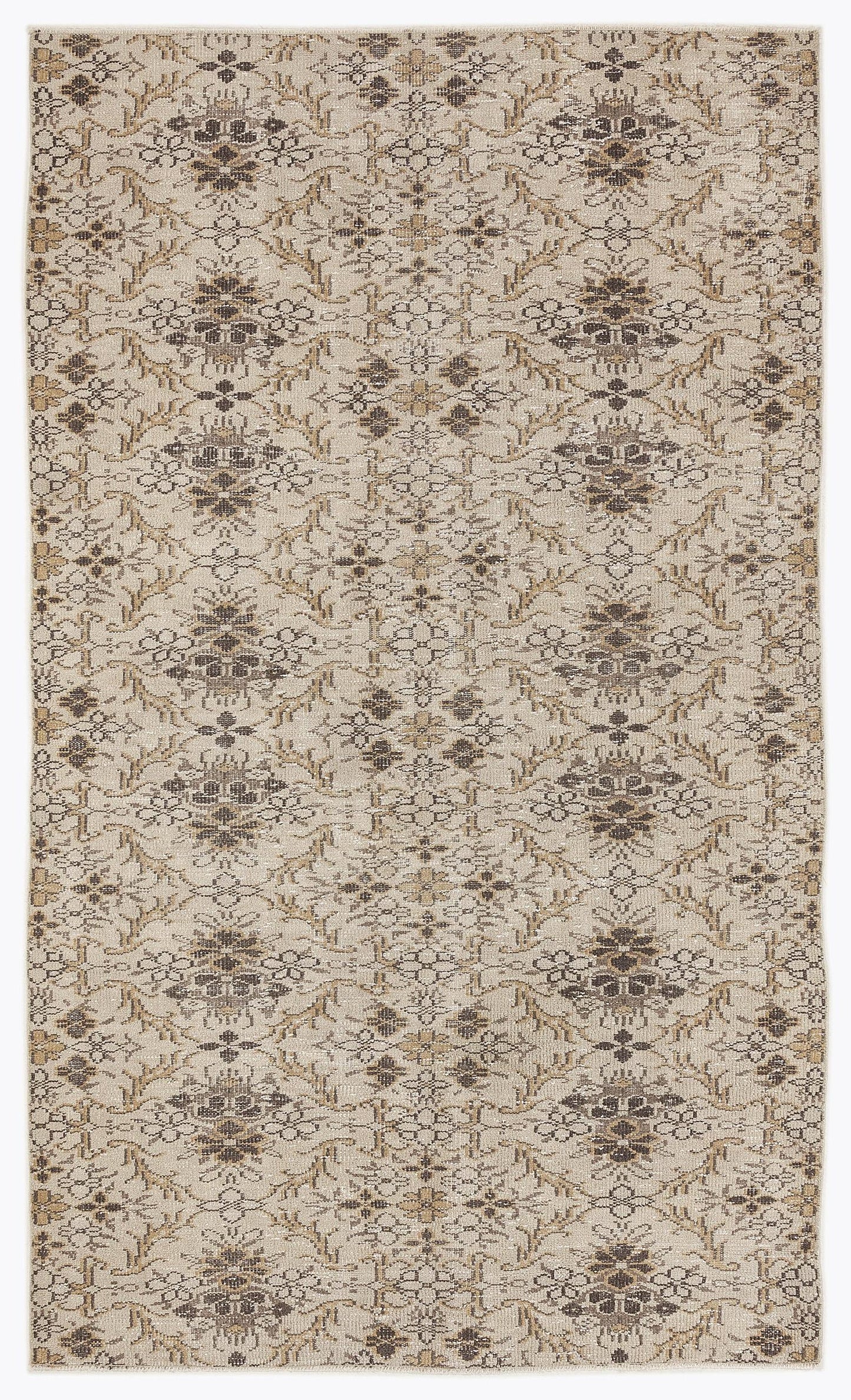 Beige and brown rug with a repeating floral medallion pattern and distressed texture on a white background.