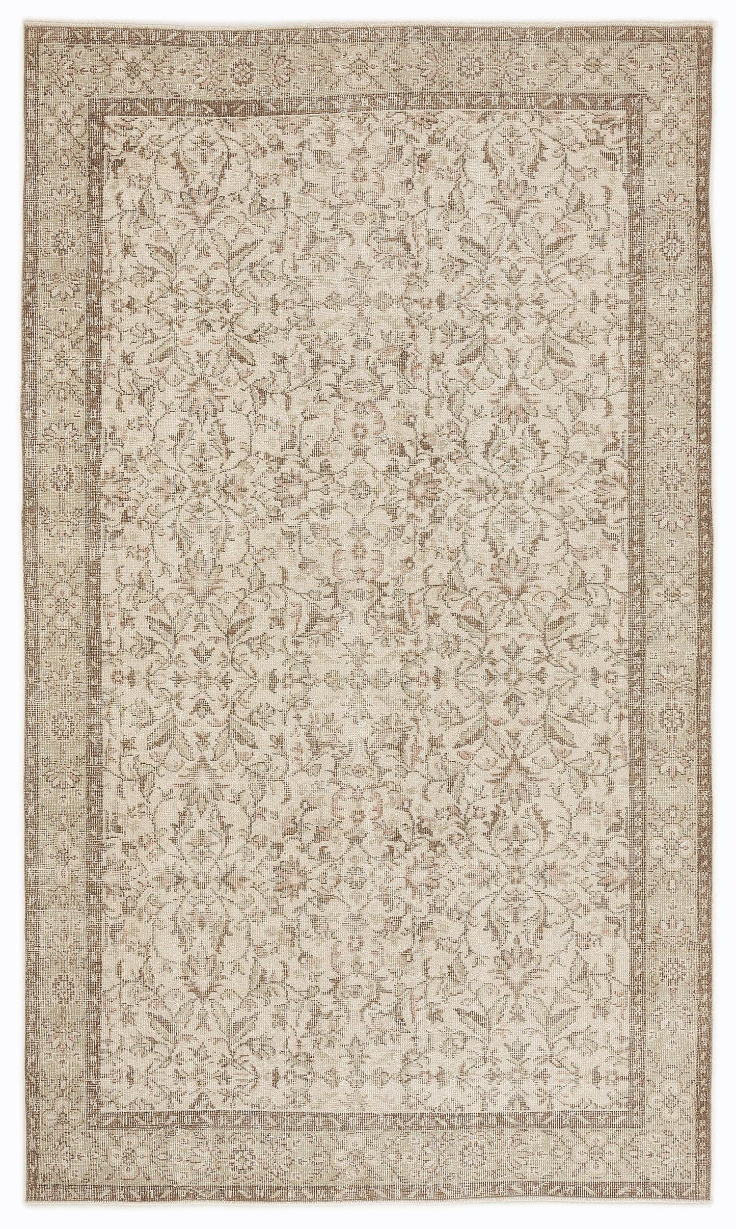 Beige and taupe traditional rug with a distressed floral medallion pattern and a detailed border.