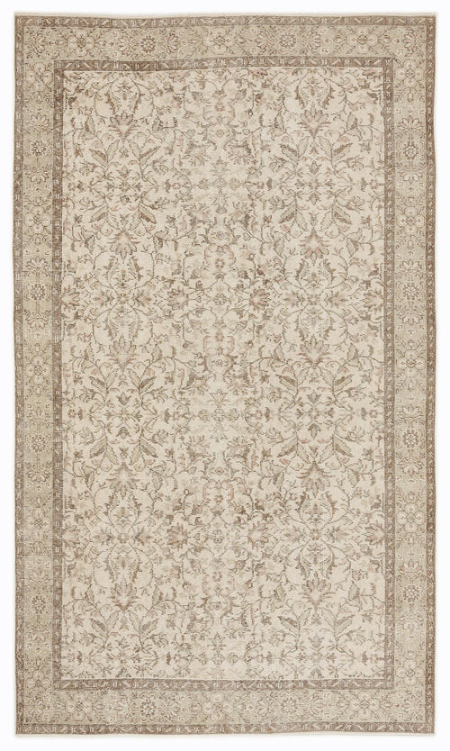 Load image 1 in gallery view. Beige and taupe traditional rug with a distressed floral medallion pattern and a detailed border.