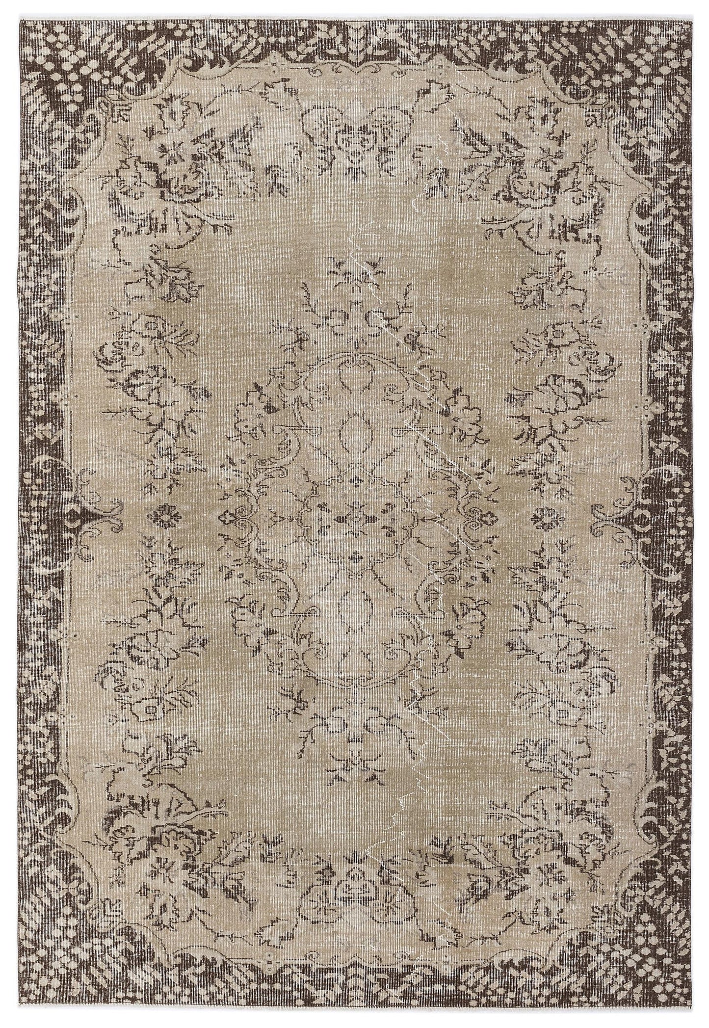 Distressed beige and dark brown traditional rug with a central floral medallion and ornate border.