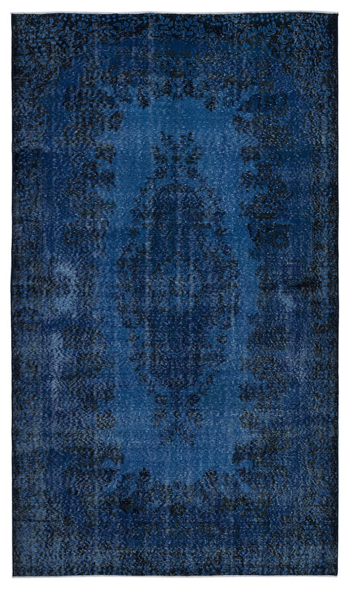 Load image 1 in gallery view. Deep blue distressed rug with a traditional central medallion and ornate floral border.