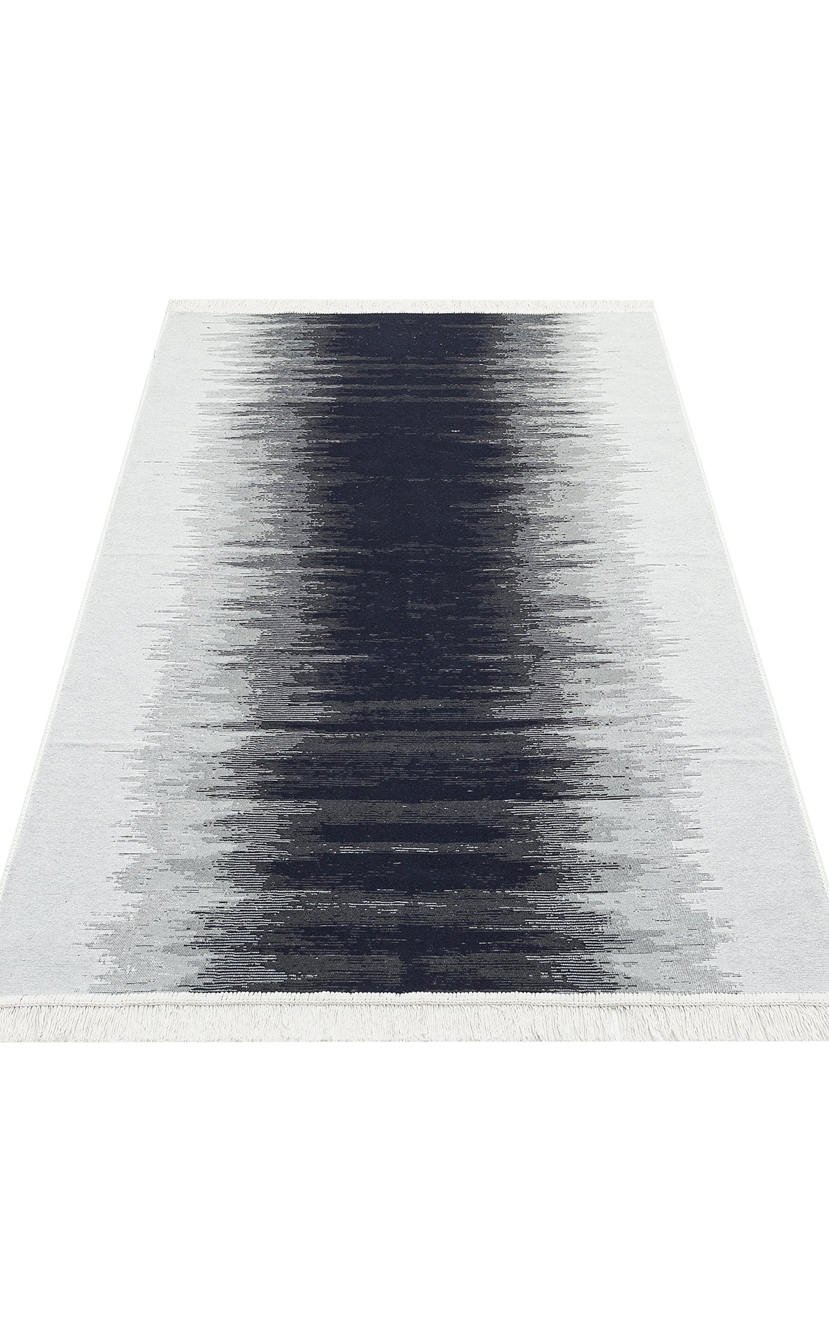 The Charcoal Frame AR40 is a rectangular, double-sided kilim rug with a black-to-white gradient design, made from recycled cotton and finished with short white fringes on the shorter edges. Washable for easy care.