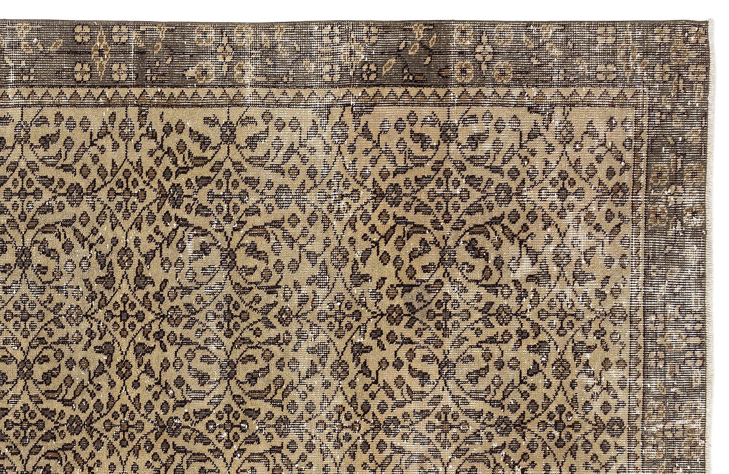 Tan and dark brown traditional rug with a distressed floral medallion pattern and a wide decorative border.