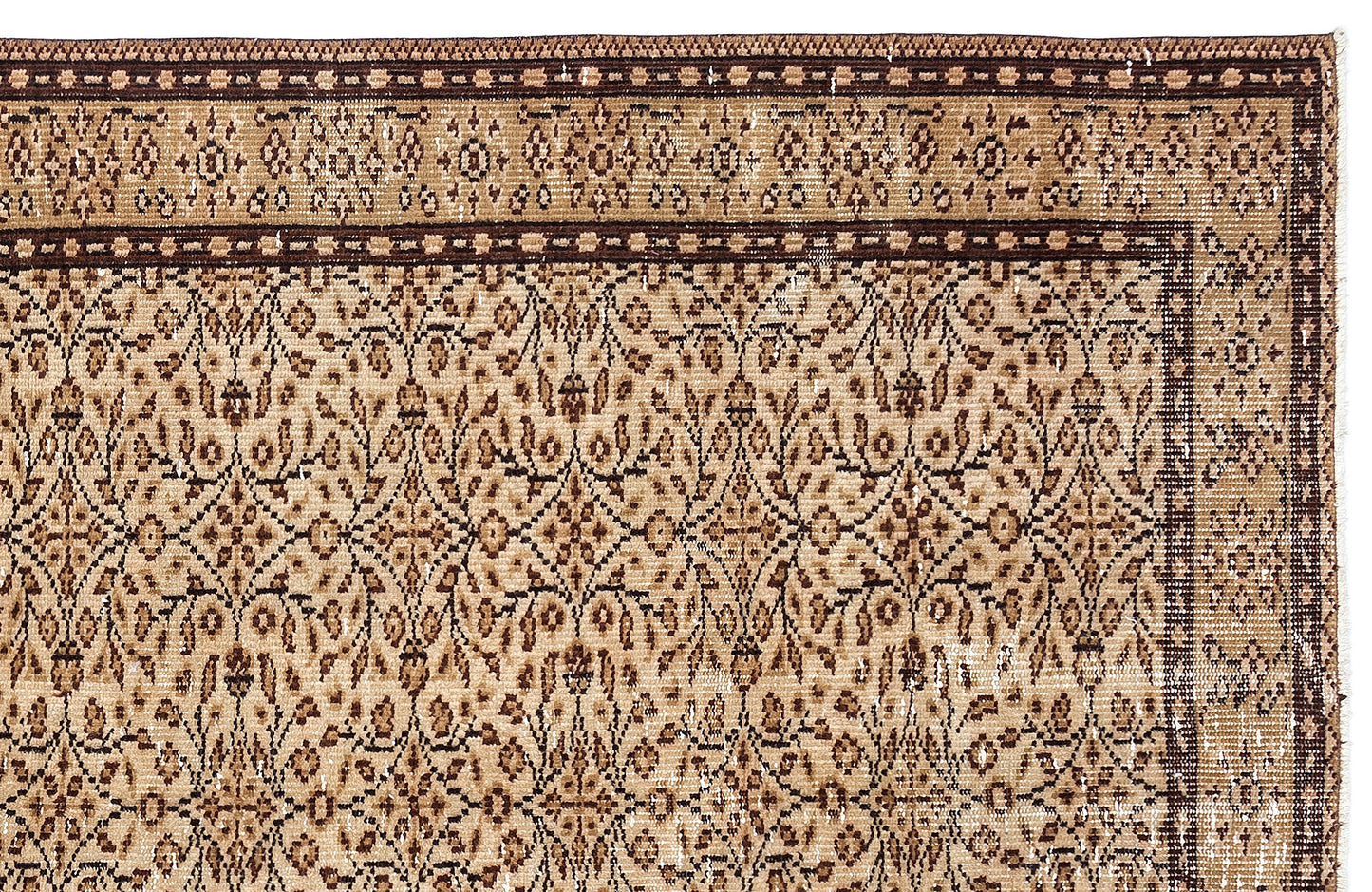 Tan and dark brown traditional rug with a dense floral vine pattern and a geometric border.