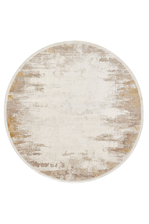 Load image 1 in gallery view. The Abstract Blitz Premium Rug - Gold - M658F is a round, machine-made piece with a distressed pattern in beige, cream, and light brown tones, offering a soft texture and a subtle blend of muted colors.
