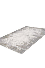 The Abstract Blitz Premium Rug - Silver - M658D is a rectangular, machine-made rug with an abstract design in gray, white, and beige tones, showcasing a modern textured and distressed look against a white background.
