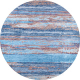 The Abstract Elegance - Machine-Washable Rug JR87 features a round blue design with beige and rust abstract patterns. Its modern, textured look and washable material make it stylish and practical for high-traffic areas in any space.