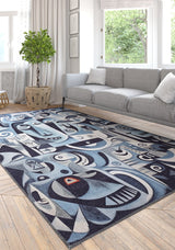 A modern living room features the Aesthetic Anomaly Contemporary Washable Rug - MDJ004 (Custom Size), with geometric and face-like patterns, under a light gray sofa, white pillows, potted plant, and large windows with white curtains.