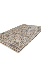 The Aged Treasures Premium Rug - 2181A is a large rectangular machine-made rug with intricate traditional beige, brown, and blue patterns, geometric designs, and a detailed border, displayed on a white background.