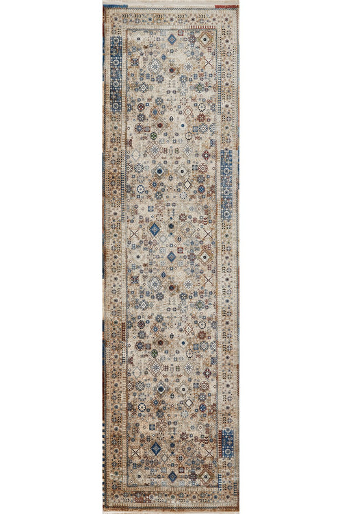 Load image 1 in gallery view. The Aged Treasures Premium Rug - 2181A is a rectangular, narrow runner with an intricate traditional pattern in muted beige, blue, brown, and red tones, complete with a detailed decorative border.