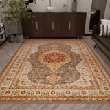A living room features the Amber Stone - Washable Rug - JRS026 in beige, red, gold, and gray on a herringbone wood floor, paired with a modern sideboard, potted plant, and dark sofa with striped cushions for a contemporary look.