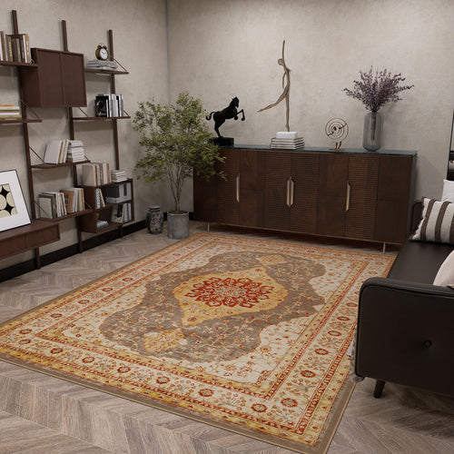 Load image 1 in gallery view. A modern living room showcases the Amber Stone - Washable Rug - JRS026 with geometric patterns, paired with wooden furniture, a sofa, bookshelves, a plant, and decorative sculptures on a sideboard—ideal for contemporary spaces.