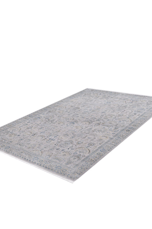 Load image 1 in gallery view. The Ancestral Motifs Turkish Rug - 2225C is a contemporary machine-made rug with a light gray background and intricate blue and beige floral patterns, crafted from soft modal silk-polyester, displayed on a plain white background.