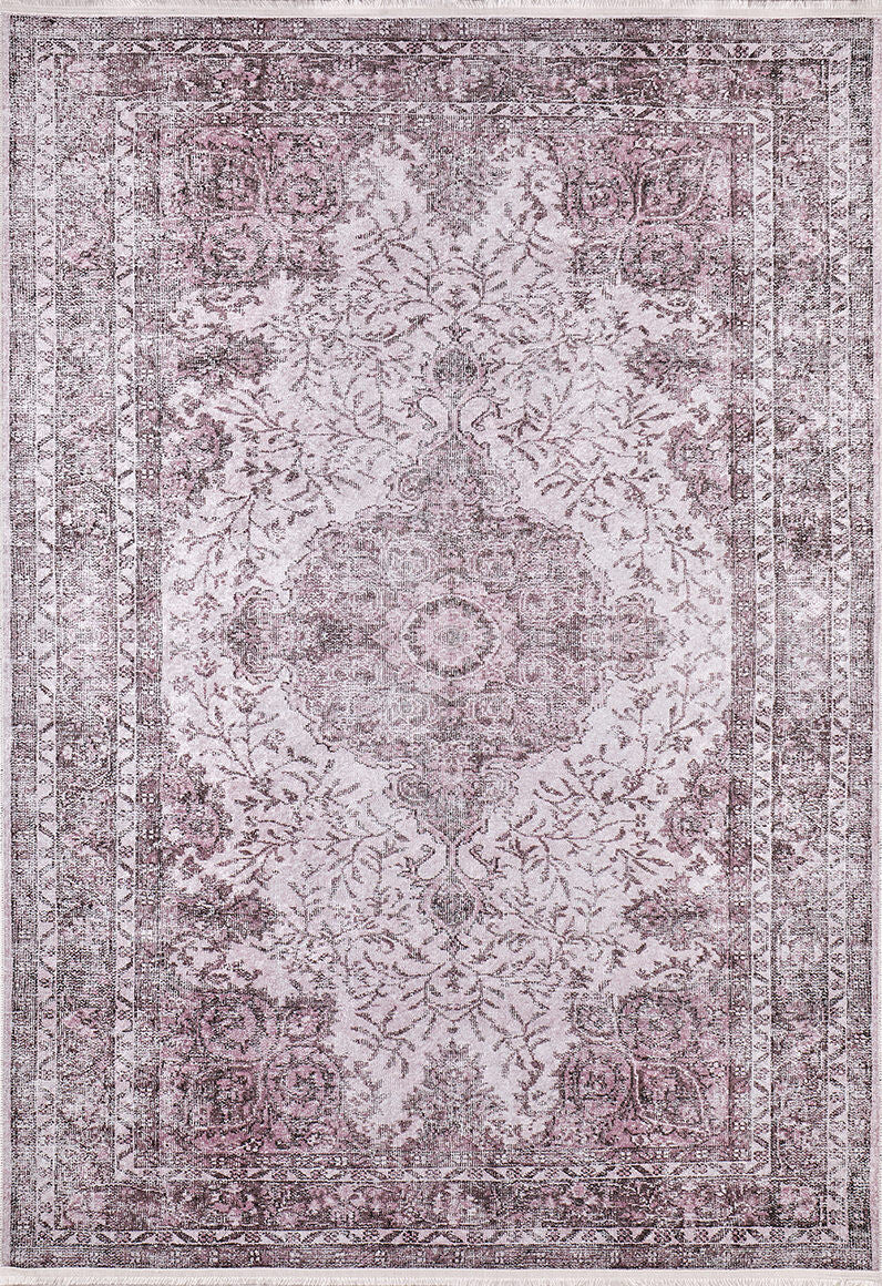 The Ancient Emblem - Washable Rug - JR200 is a rectangular, vintage-style rug with a faded floral and geometric pattern in muted mauve, pink, and gray tones. It’s washable and ideal for high-traffic areas, featuring a central medallion and ornate borders.