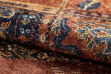 Close-up of the Ancient Palace - Washable Rug - JR1864 (Custom Size), featuring a rolled, patterned orange design with rich brown and dark blue accents, intricate traditional motifs, and a soft, velvety texture—ideal for high-traffic areas.