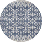 The Antique Flourish - Washable Rug - JR1591 is an oval-shaped blue rug with elegant white floral and geometric patterns, offering a washable design that’s perfect for high-traffic areas.